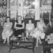 Four older women sitting on a couch talking